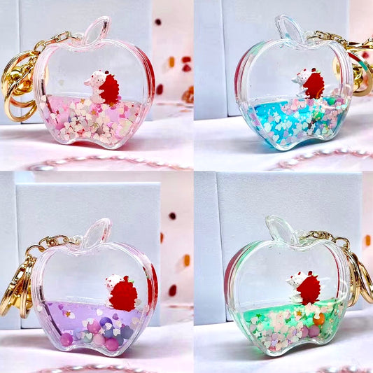 X 12111 APPLE FLOATY KEY CHARM-DISCONTINUED