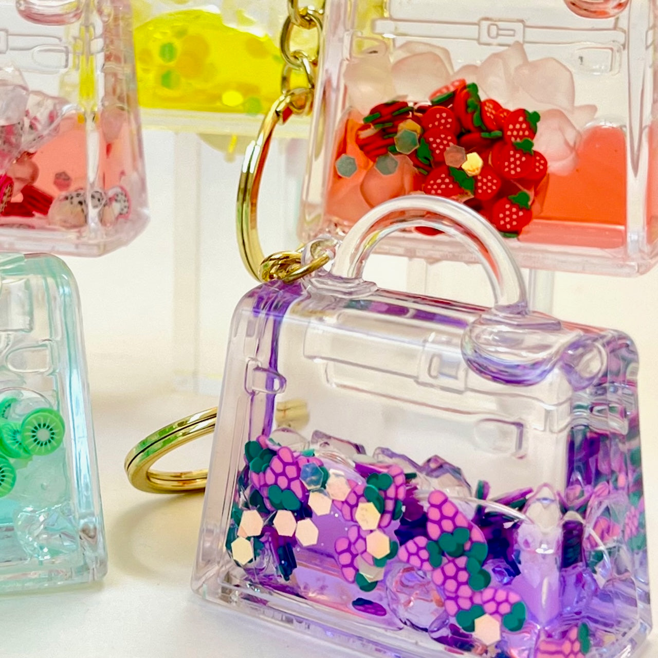 X 12131 FRUIT PURSE FLOATY KEY CHARM-DISCONTINUED