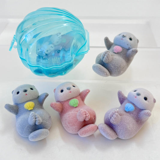 X 70324 Sea Otter Flock Figurine Capsule-DISCONTINUED