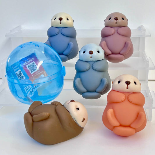 X 70379 Otter Figurine Capsule-DISCONTINUED