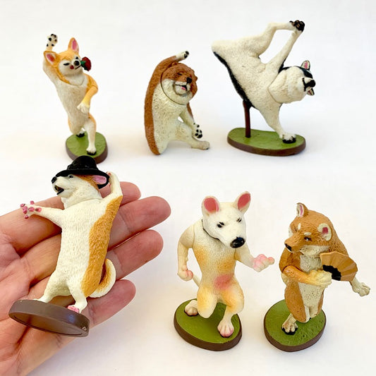 X 70715 DANCING DOG FIGURINES-DISCONTINUED