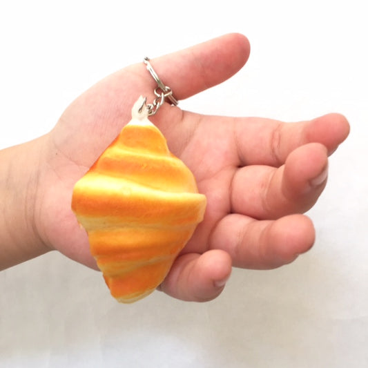 X 83027 CROISANT SQUISHY-DISCONTINUED