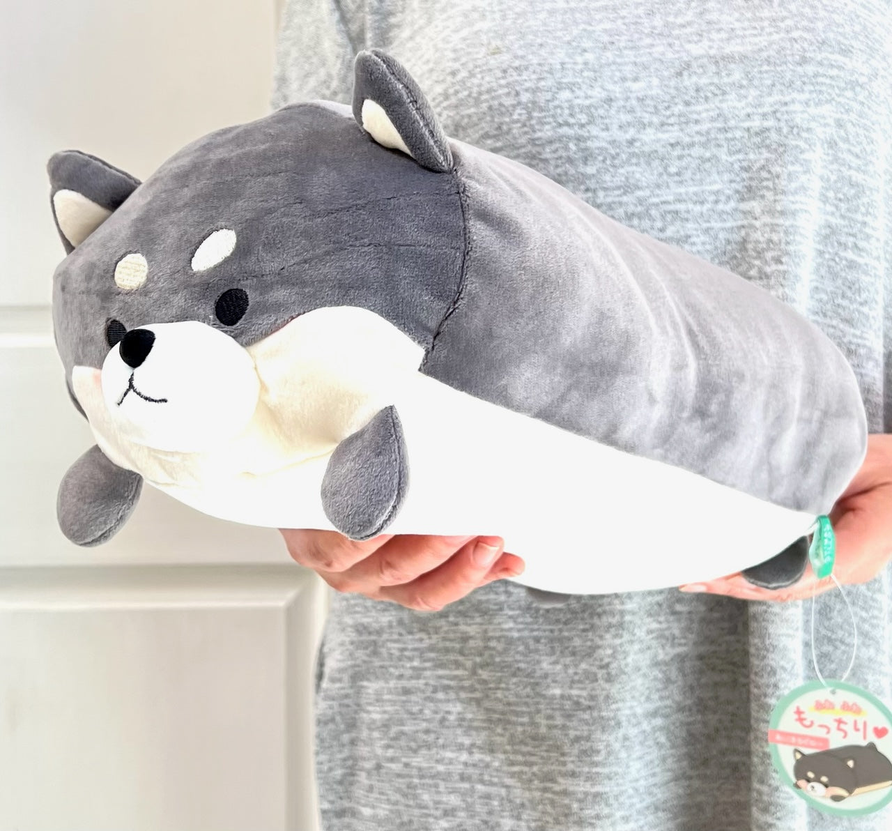 X 63290 CRUX BLACK DOG PILLOW PLUSH-DISCONTINUED