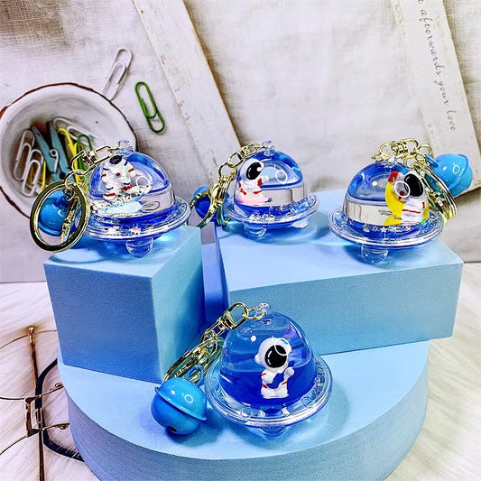 12102 ASTRONAUT UFO FLOATY KEY CHARM-12
