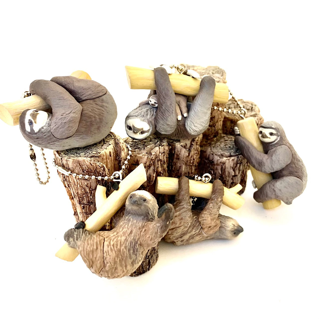 X 70839 SLOTH CHARM CAPSULE-DISCONTINUED