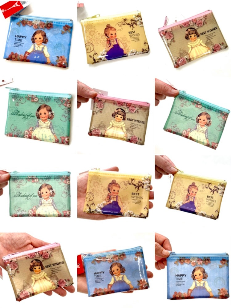 X 10064 CLASSIC DOLL COIN PURSE-DISCONTINUED