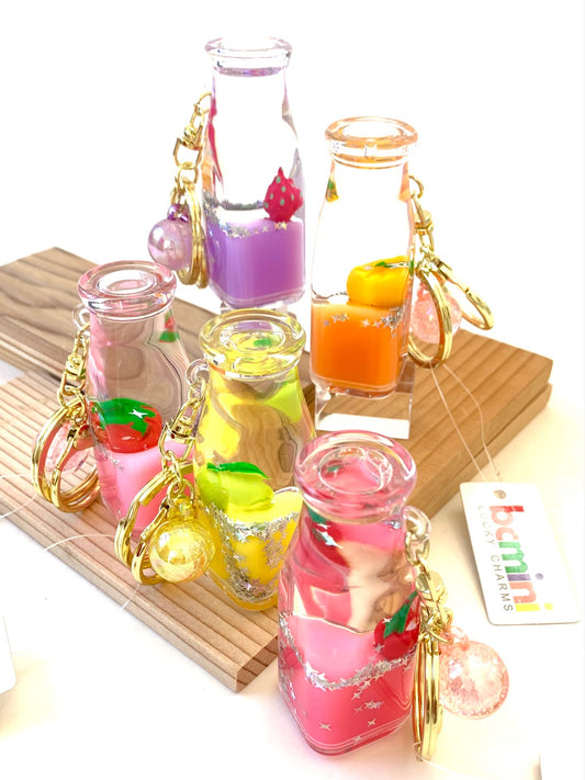 X 12071 FRUIT BOTTLE FLOATY KEY CHARM-DISCONTINUED