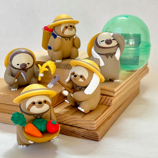 X 70247 Farmer Sloth Figurine Capsule-DISCONTINUED