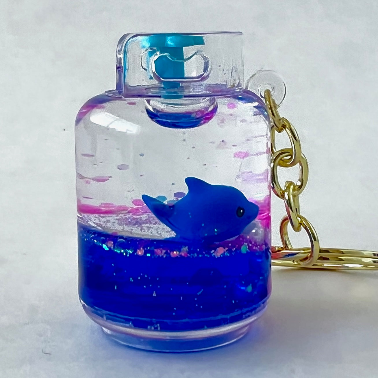 12129 BLUE DOLPHIN COMBO FLOATY KEY CHARM-12