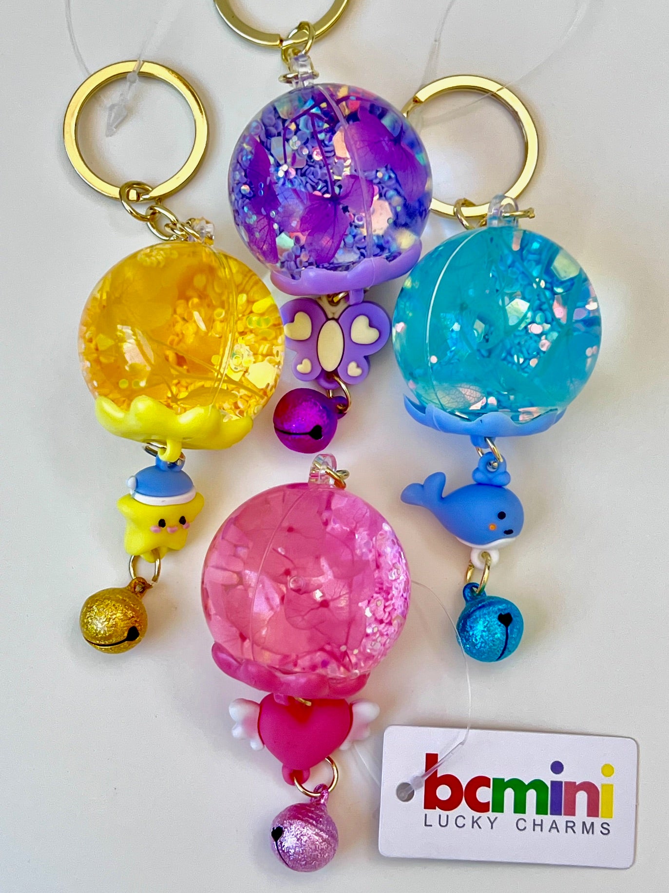 12150 COLORFUL ORB ASSORTED FLOATY KEY CHARM-12