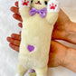 X 63377 MEDIUM LONG CAT PLUSH-DISCONTINUED