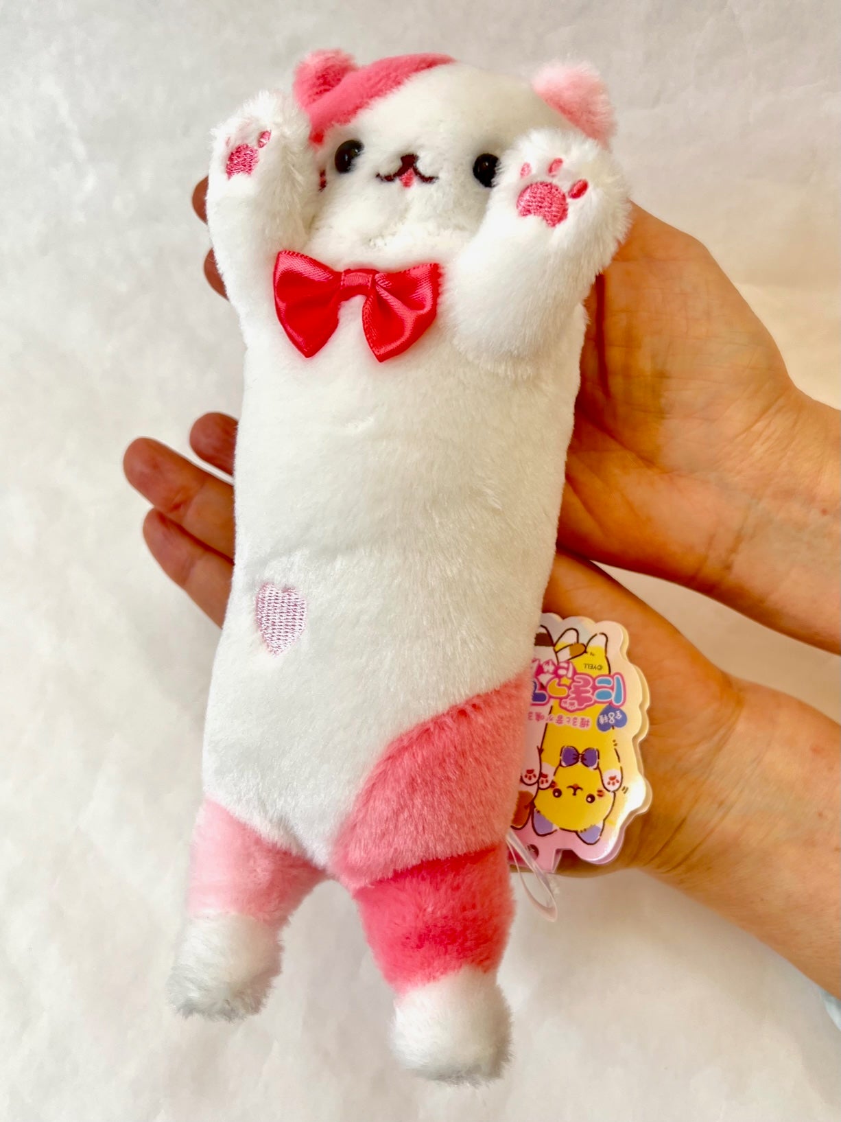 X 63377 MEDIUM LONG CAT PLUSH-DISCONTINUED