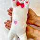 X 63377 MEDIUM LONG CAT PLUSH-DISCONTINUED