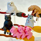 X 70274 Flying Broom Animals Figurine Capsule-DISCONTINUED