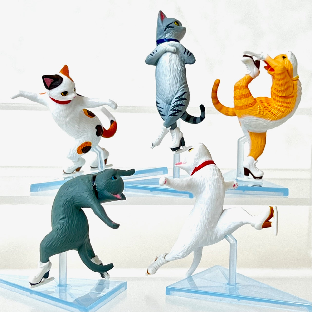 X 70261 Cat Ice Skating Figurine Capsule-DISCONTINUED