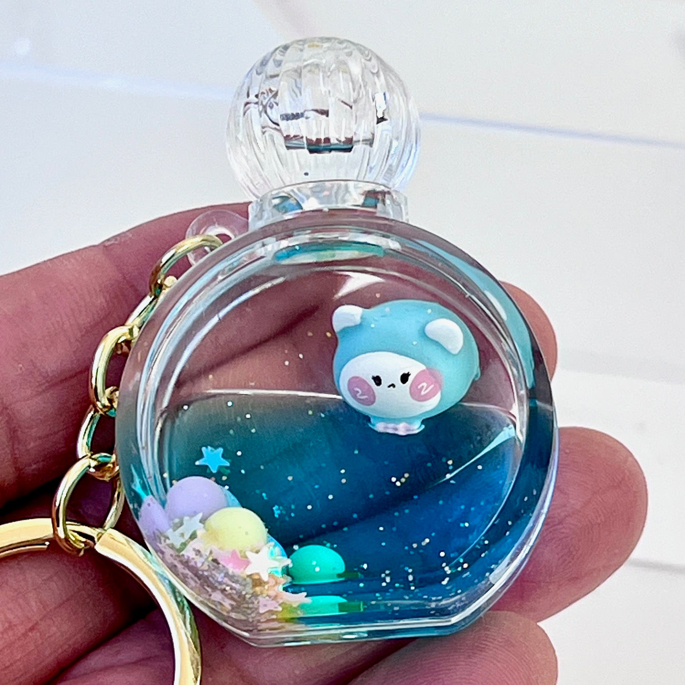 12114 KITTY PERFUME BOTTLE FLOATY KEY CHARM-12