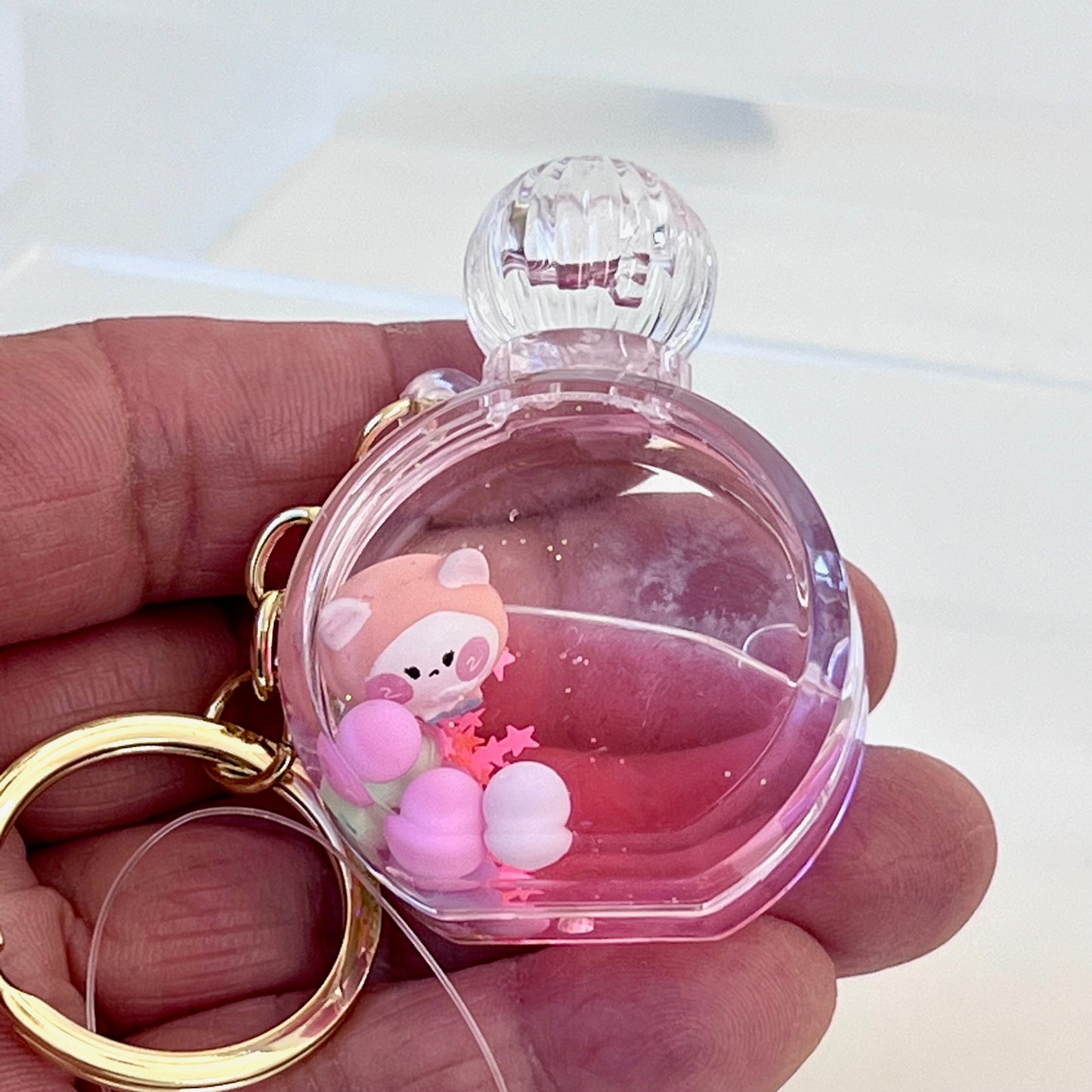 12114 KITTY PERFUME BOTTLE FLOATY KEY CHARM-12