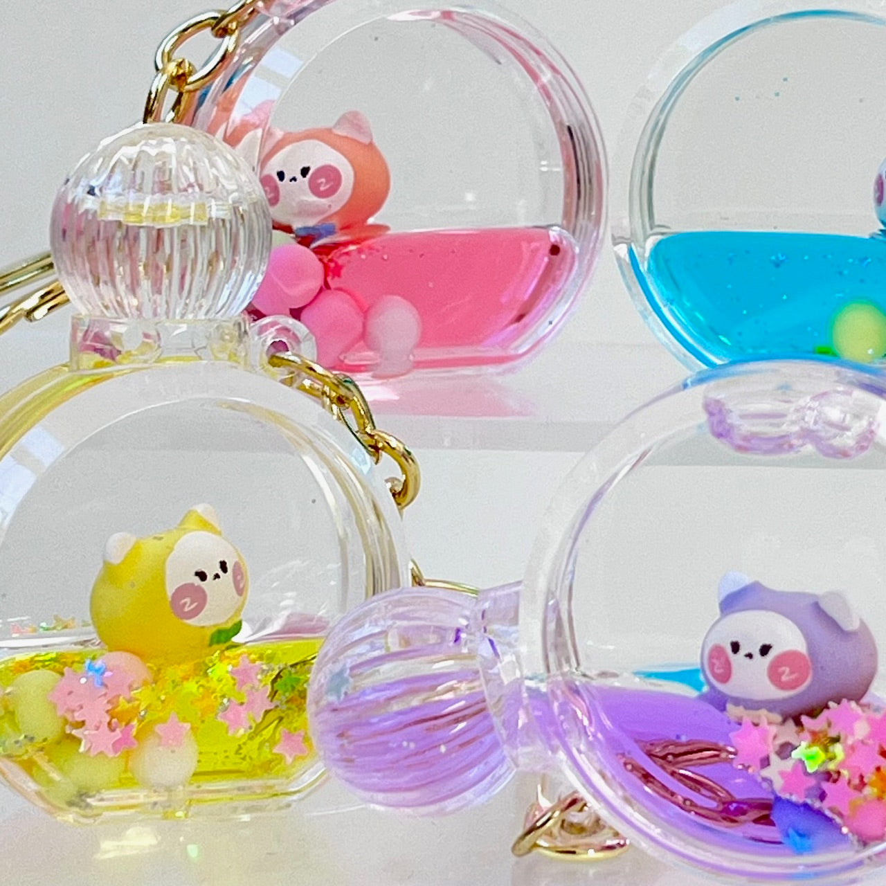 12114 KITTY PERFUME BOTTLE FLOATY KEY CHARM-12