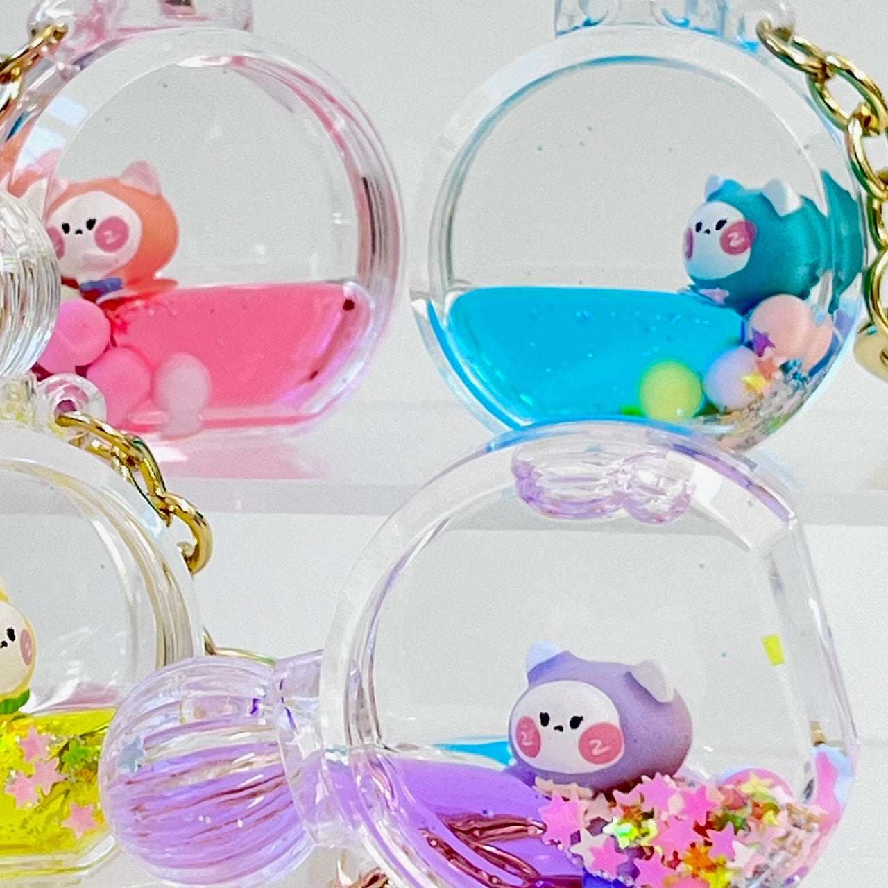 12114 KITTY PERFUME BOTTLE FLOATY KEY CHARM-12