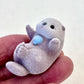 X 70324 Sea Otter Flock Figurine Capsule-DISCONTINUED