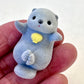 X 70324 Sea Otter Flock Figurine Capsule-DISCONTINUED