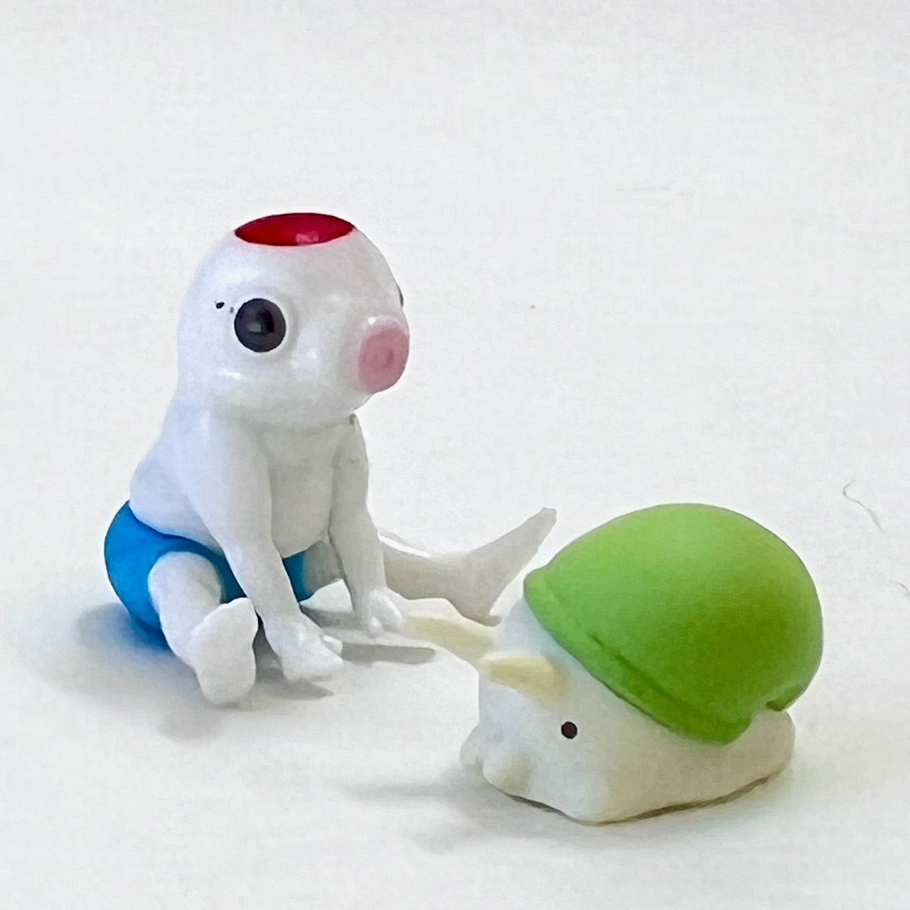 X 70325 Koi-Man Figurine Capsule-DISCONTINUED