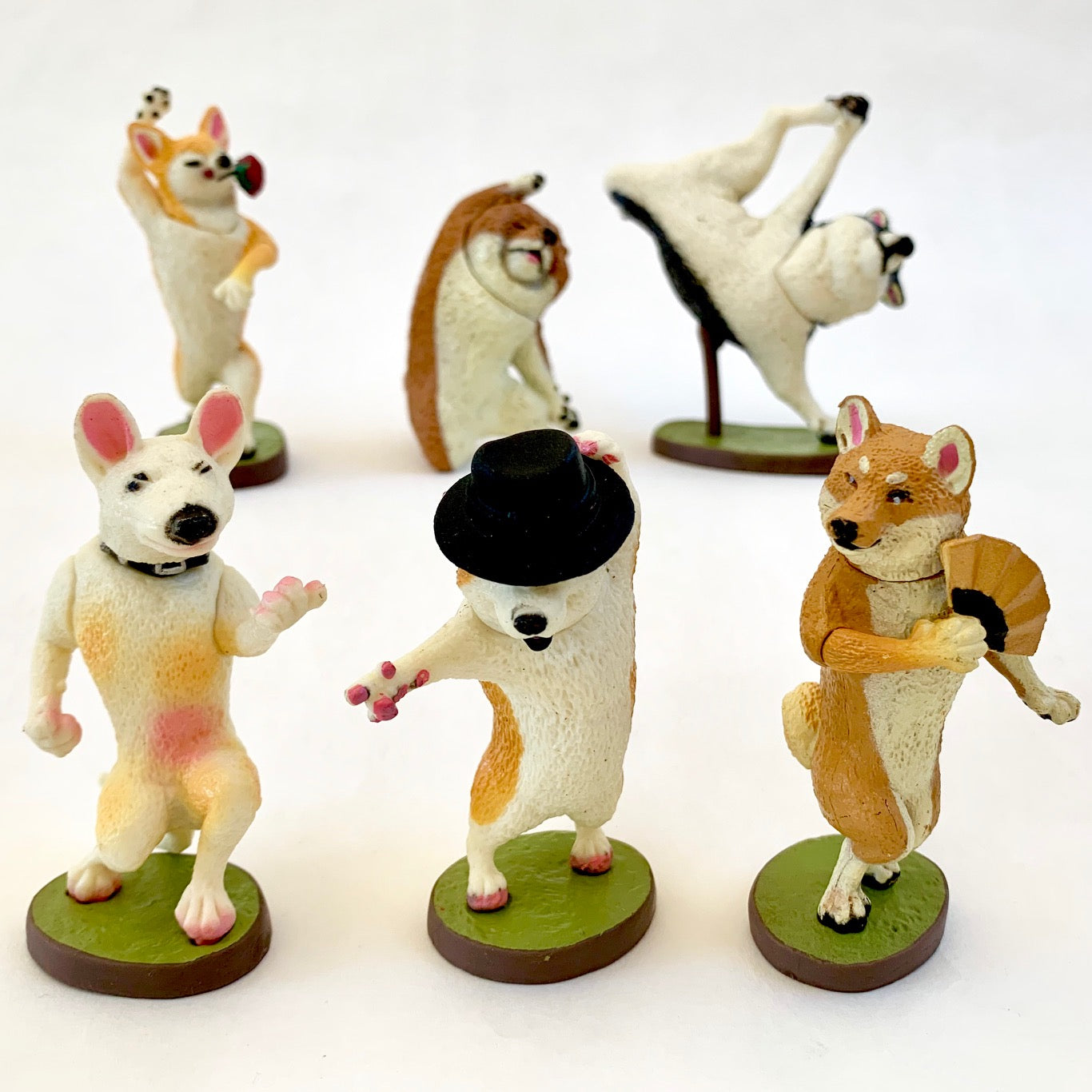 X 70715 DANCING DOG FIGURINES-DISCONTINUED