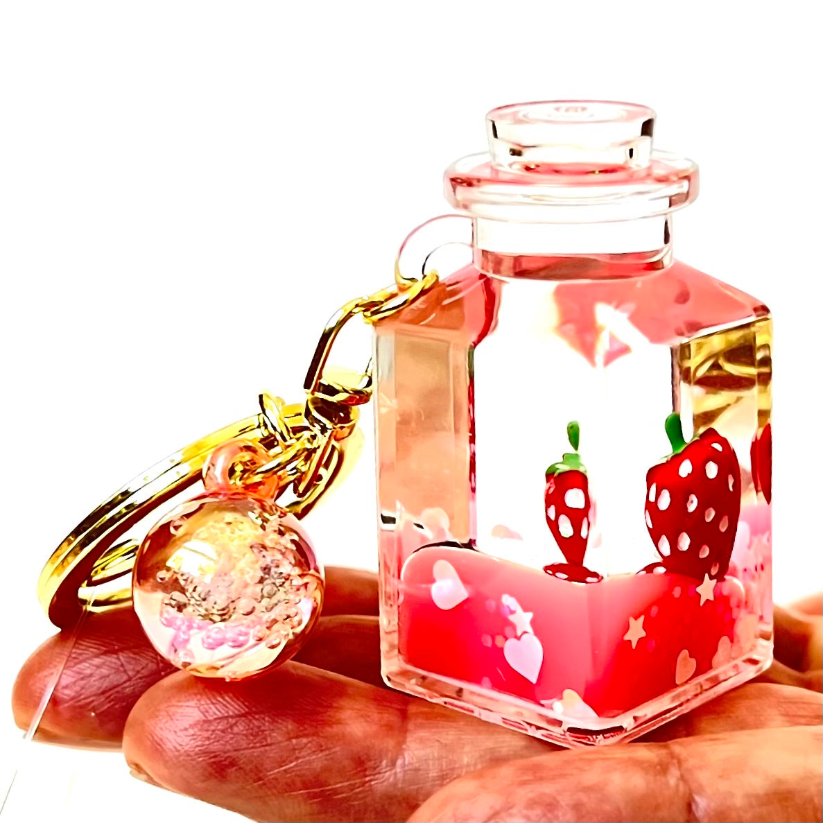 Mortilo Keychains Strawberry Fruit Jar Into Oil Keychain Pink
